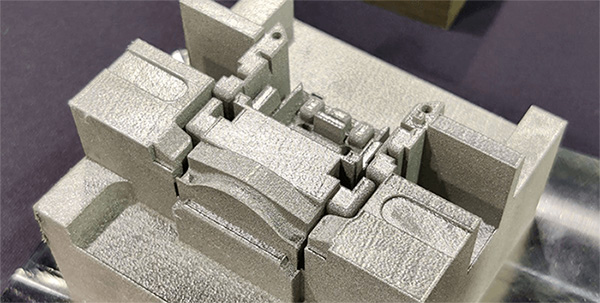 3D-printad metallkomponent med komplex geometri och interna kanaler